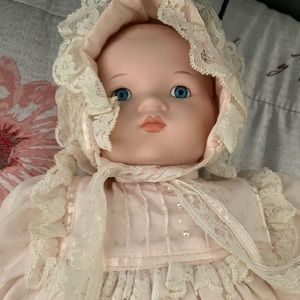 Porcelain doll with music box